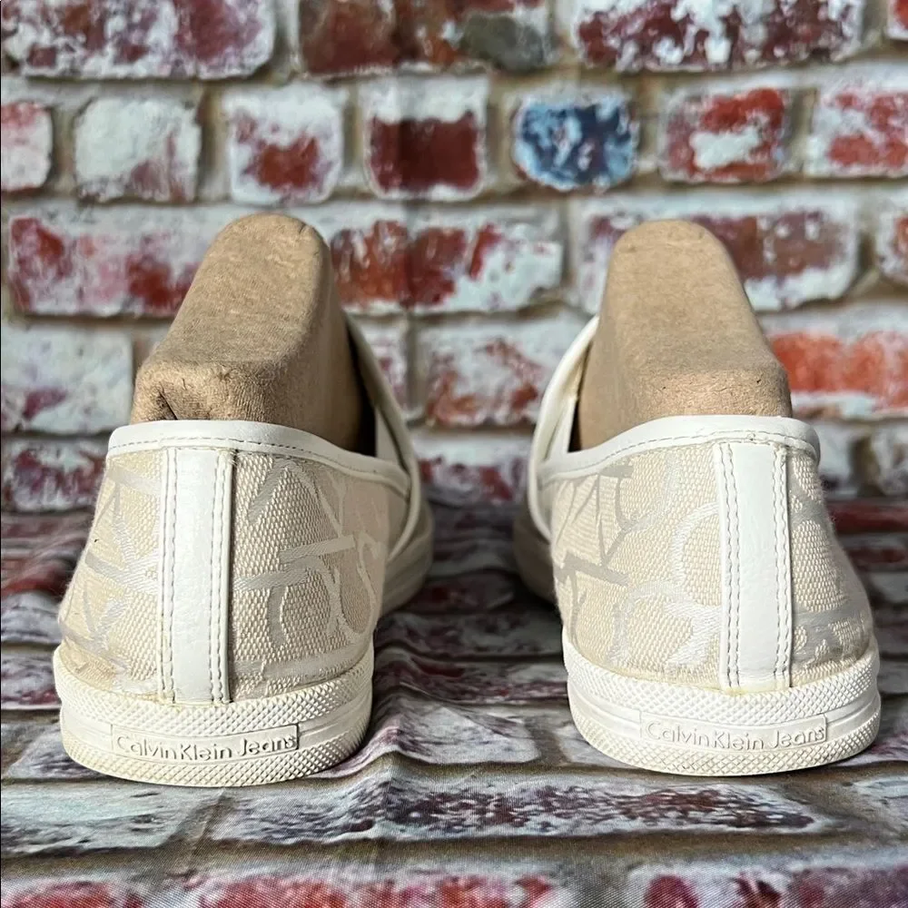 * Calvin Klein Cream Slip-On Sneakers